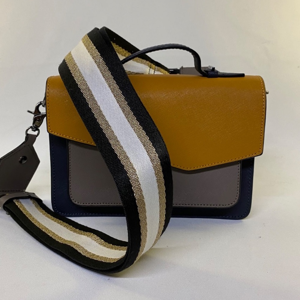 This is a Botkier Cobble Hill color-block leather crossbody bag.